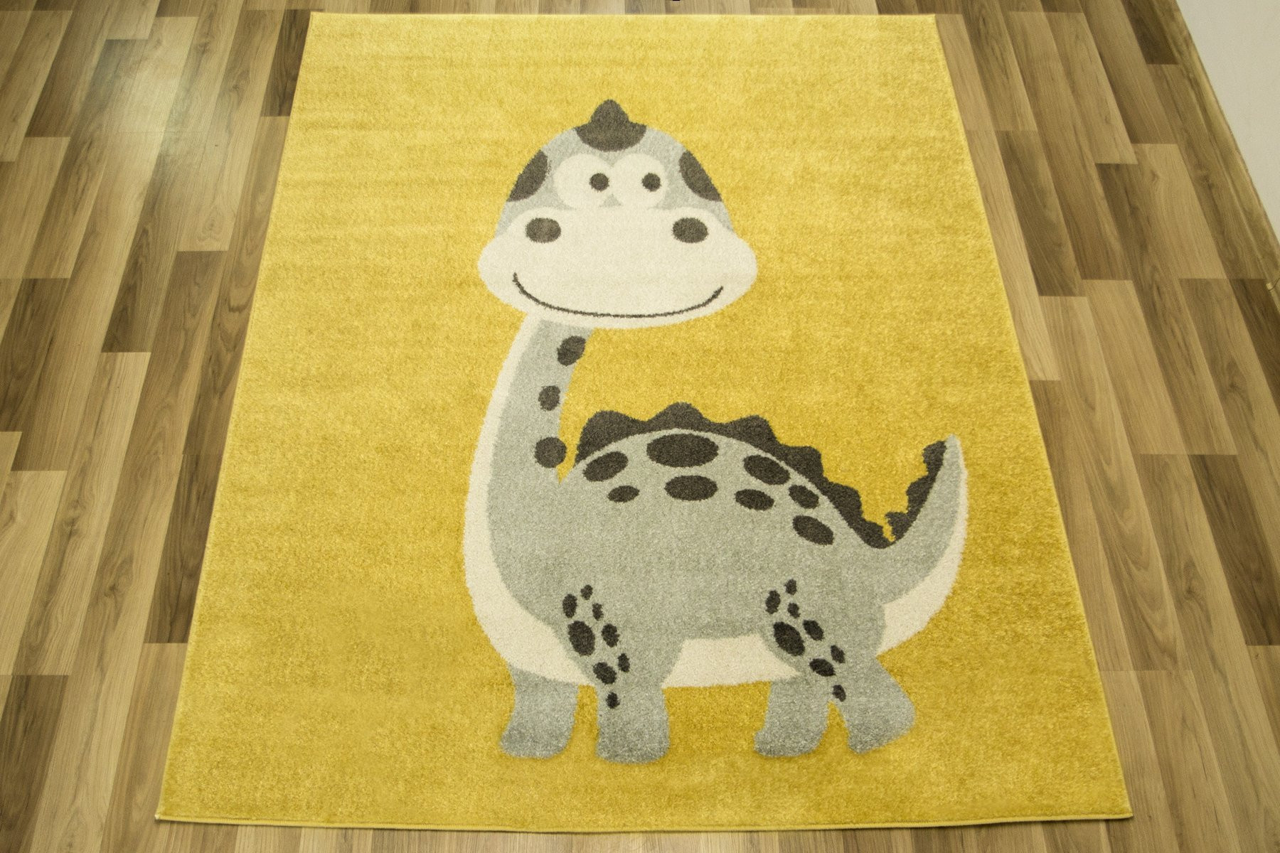 Detský koberec Emily Kids 5860D Dinosaurus žltý