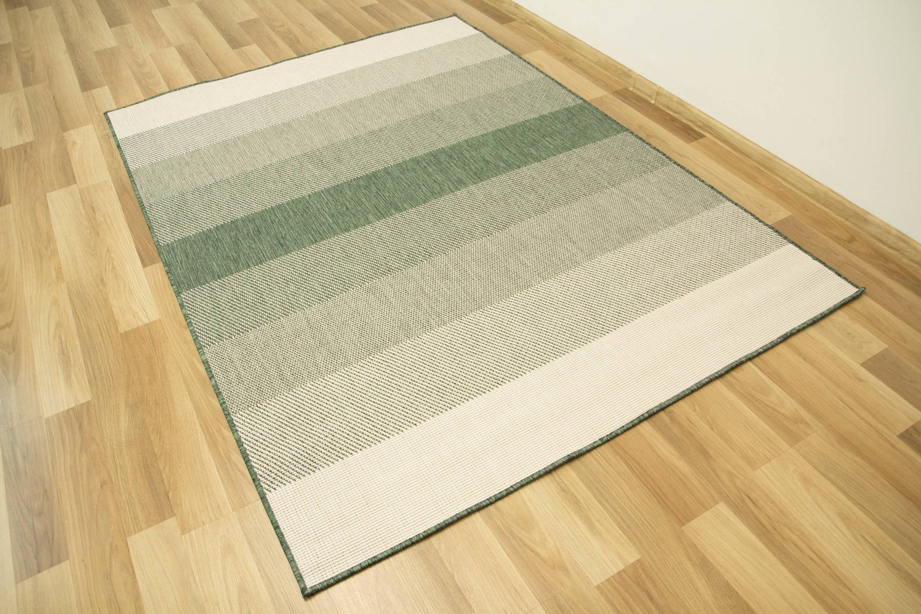 Šnúrkový obojstranný koberec Brussels 205248/10510 zelený