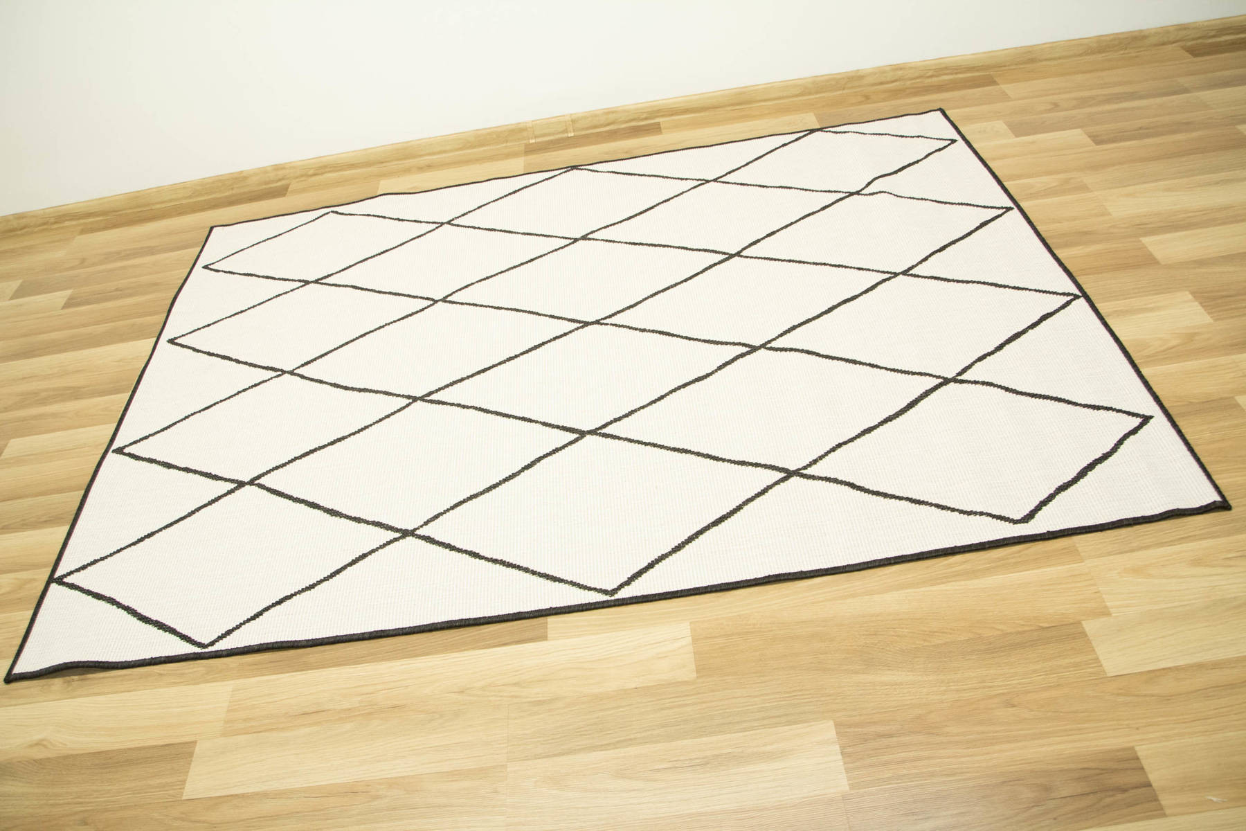 Šnúrkový obojstranný koberec Brussels 205628/10110 antracitový/krémový