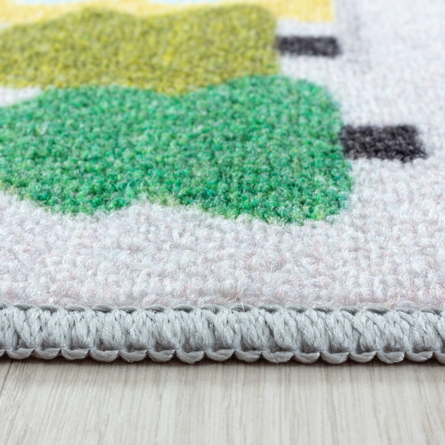 Detský protišmykový koberec Play uličky sivý