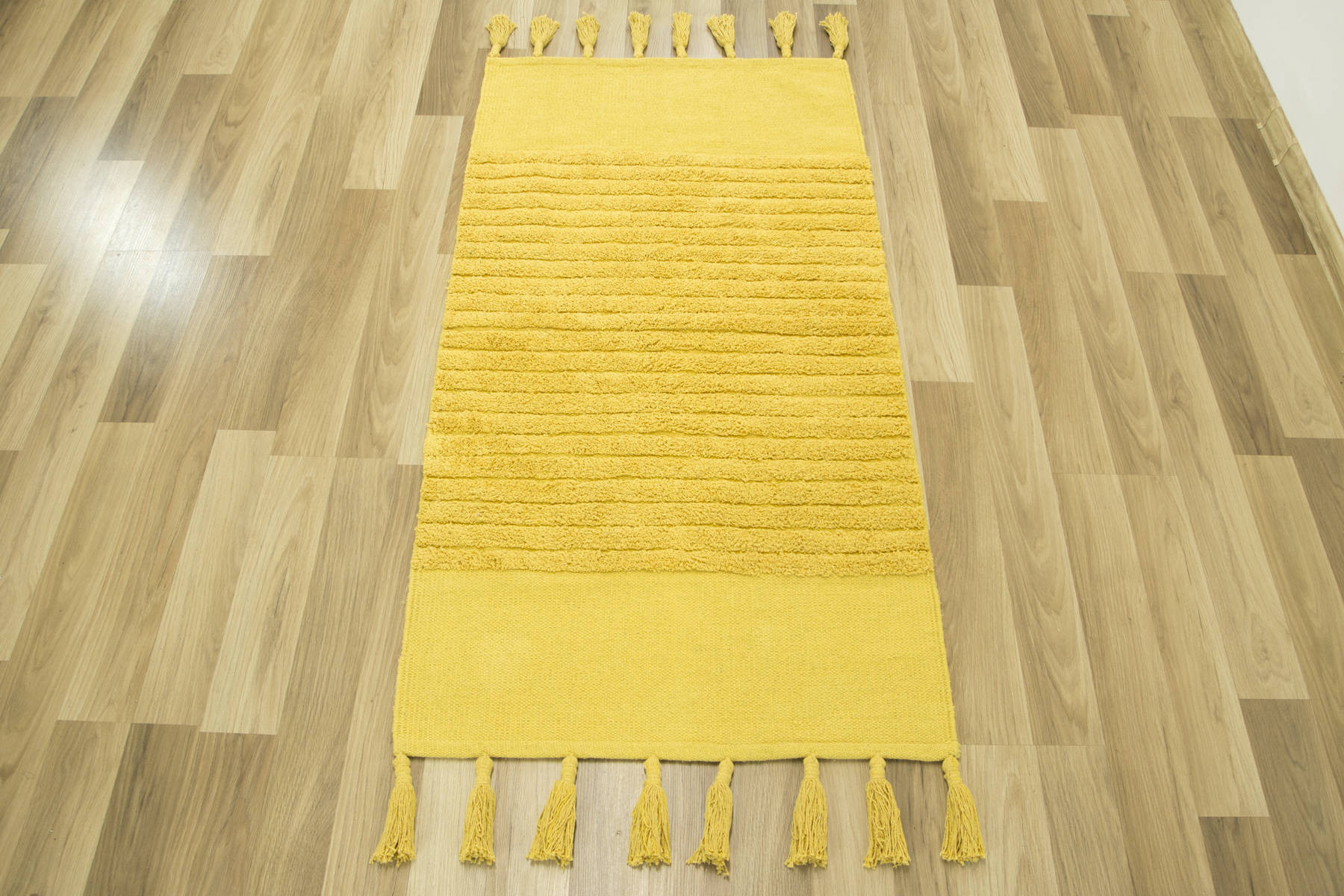 Bavlnený koberček Kilim so strapcami žltý